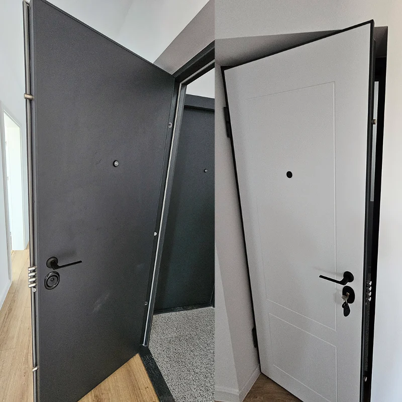 Open apartment entrance door, anthracite on one side and white on the other