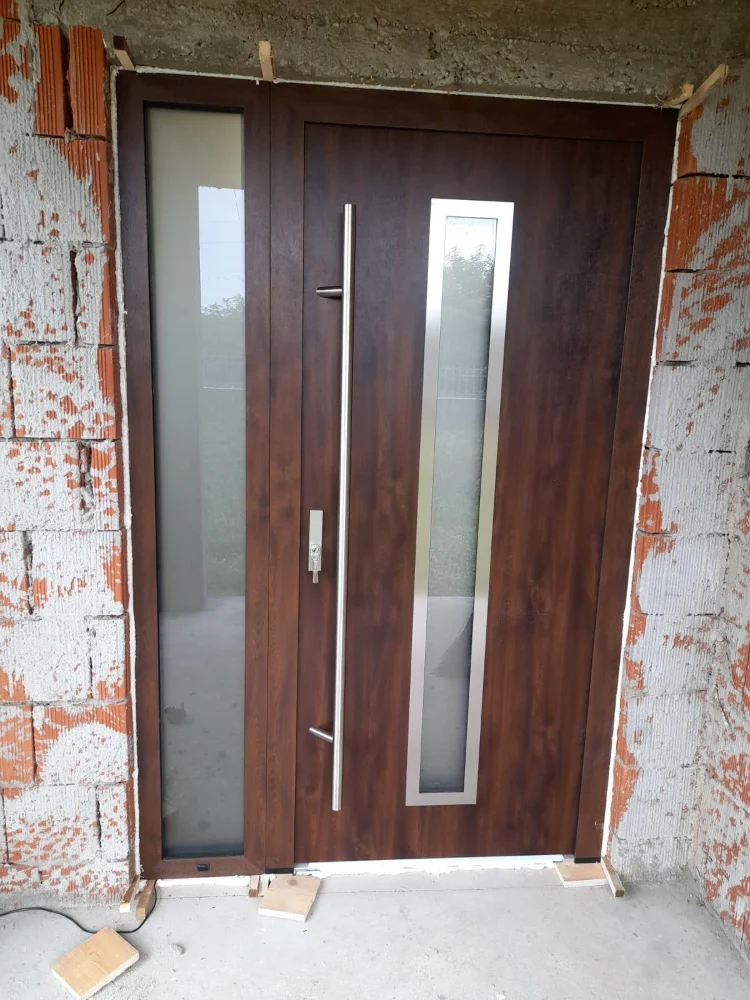 Entrance door with a wood-effect finish and glass inserts