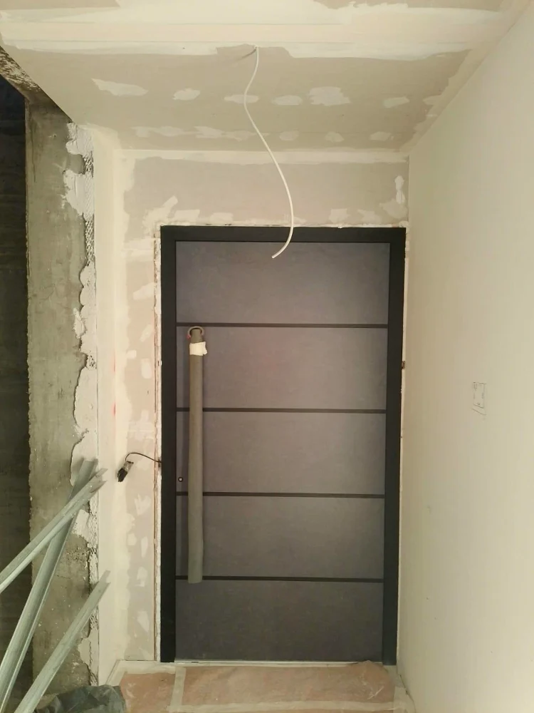 Grey entrance door with horizontal inserts
