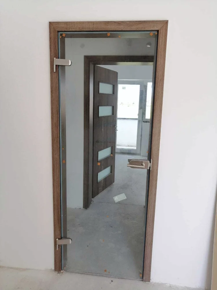 Glass door with a wood-effect frame